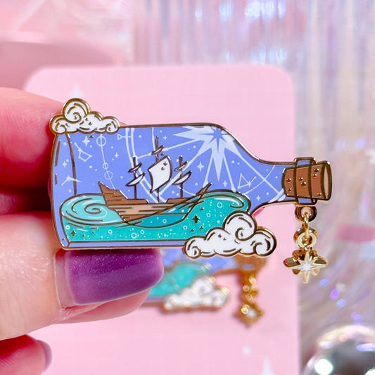 Ship in a Bottle enamel pin with glitter and mini dangle charm, gold plated