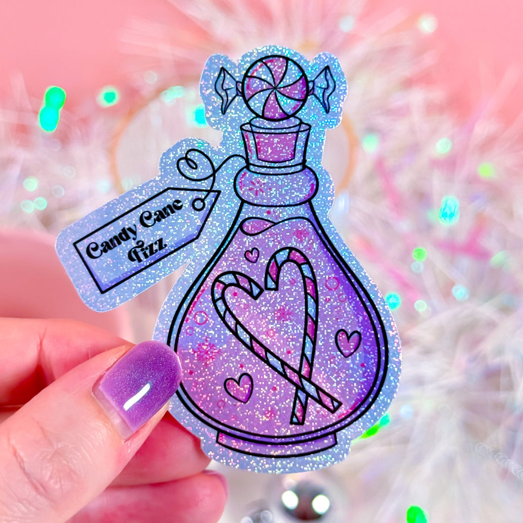 Candy Cane Fizz Potion holographic glitter sticker with festive candy cane design