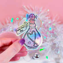 Load image into Gallery viewer, Close-up of Candy Cane Fizz Potion glitter sticker, glossy vinyl with sparkling details