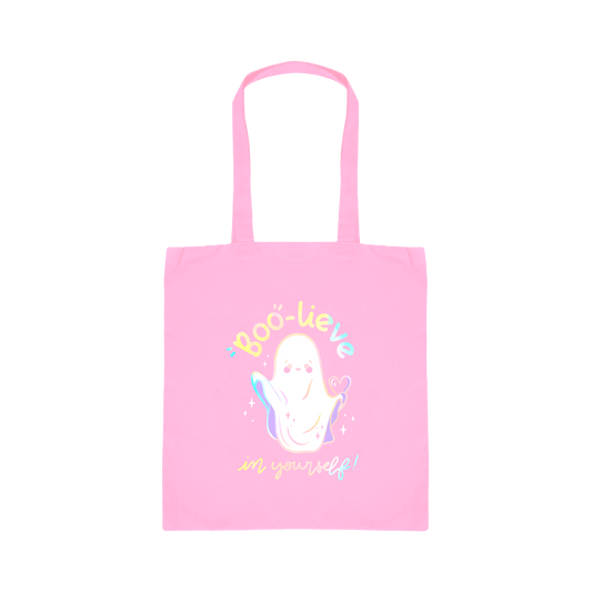 Pink tote bag with a ghost illustration and text on a white background