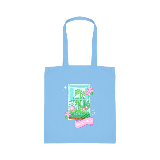Light blue tote bag with a colorful design on a white background